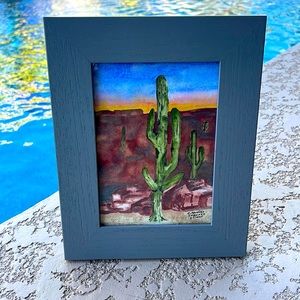 Watercolor of Saguaro Cactus by artist C. Hensley. 5 X 7”. Frame is not great.
